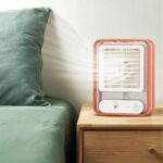 Lightweight portable USB air cooler fan in hand
