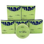 Mad Dental teeth whitening powder with natural ingredients background