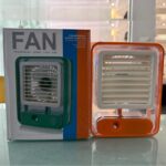 Mist spray function active on portable USB air cooler fan