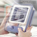 Compact USB fan with built-in LED nightlight turned on