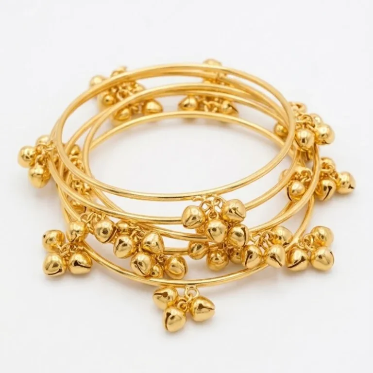 Brass gold Kashmiri ghunghroo bangles set close-up
