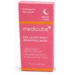 Applying Medicube collagen night wrapping mask on face