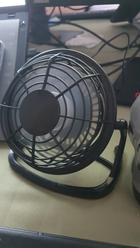 Silent USB Desk Fan 4 Blade Rotatable Mini Cooler photo review
