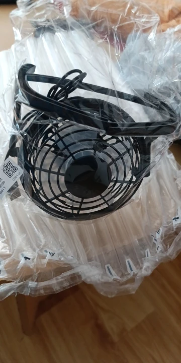 Silent USB Desk Fan 4 Blade Rotatable Mini Cooler photo review