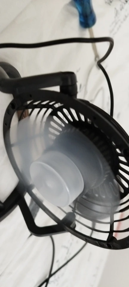 Silent USB Desk Fan 4 Blade Rotatable Mini Cooler photo review