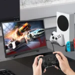 Monitor displaying gaming content with built-in speakers