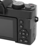 Close-up of 16X zoom lens on 4K mirrorless camera