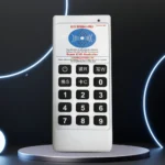 Close-up view of handheld RFID IC card duplicator showing buttons