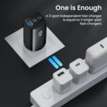 65W GaN charger plugged into wall outlet charging devices