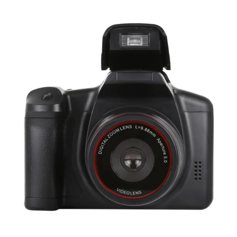 Compact black mirrorless digital camera showing lens and screen