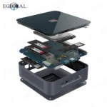 Eglobal Mini PC next to gaming accessories for scale