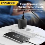 Essager 65W GaN charger next to smartphone and laptop