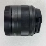 Canon EF-M 15-45mm lens mounted on camera