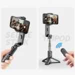 Tripod setup of handheld gimbal stabilizer holding smartphone