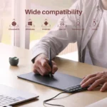 Close-up of Huion Inspiroy 2 S programmable keys and scroller wheel