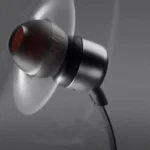 Side view of JBL TUNE 310C wired in-ear headphones with flat cable