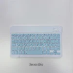 Keyboard paired with an iPad showcasing compact portable size