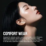 Monster AuraFit GT22 earbuds displayed with charging cable and manual