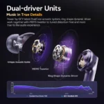 Close-up of QCY MeloBuds N70 earbuds showing silicone ear tips