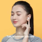 QCY T13 wireless earbuds with silicone ear tips close-up