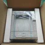 Close-up of Canon LaserJet LBP 2900 printer USB connection port