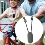 Mini camcorder mounted on sports bracket for outdoor use